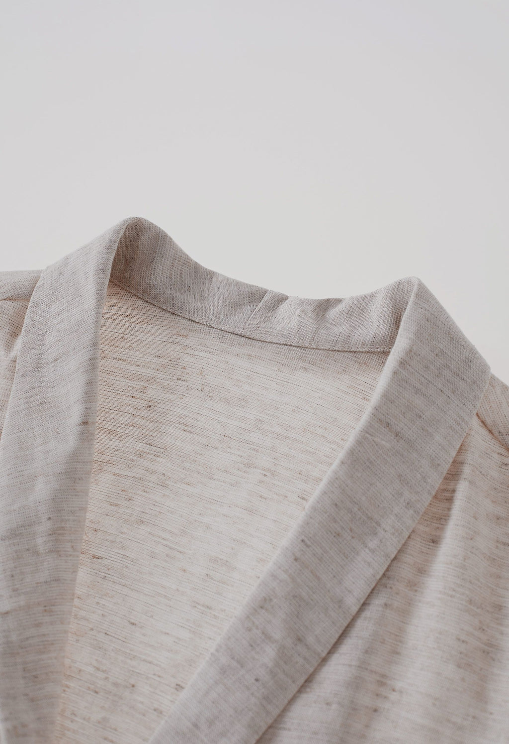 Elegant V-neck belted office top in breathable linen blend