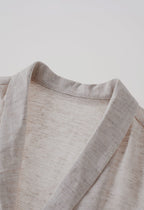 Elegant V-neck belted office top in breathable linen blend