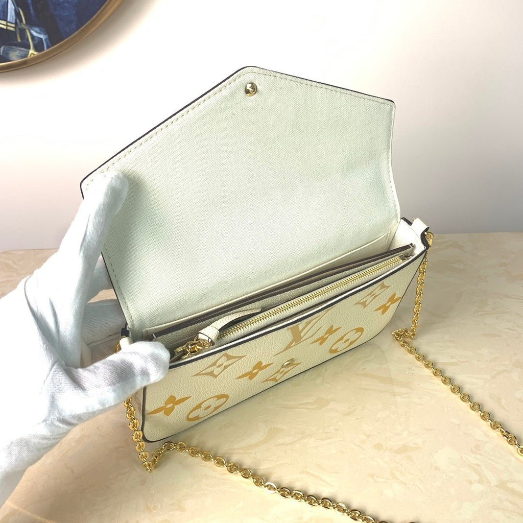Louis Vuitton Monogram Empreinte Pochette 21cm White