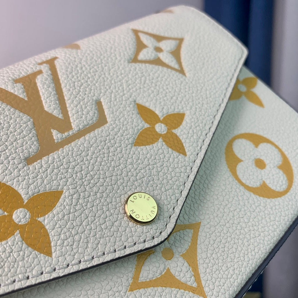 Louis Vuitton Monogram Empreinte Pochette 21cm White