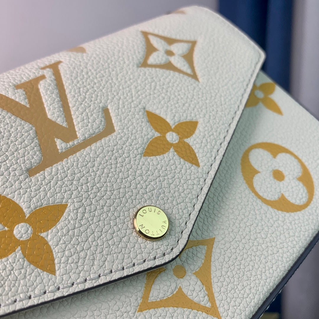 Louis Vuitton Monogram Empreinte Pochette 21cm White