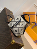 Louis Vuitton The NéoNoé MM M46023 bucket bag in Monogram Empreinte Crème Beige / Black
