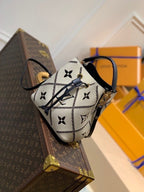 Louis Vuitton The NéoNoé MM M46023 bucket bag in Monogram Empreinte Crème Beige / Black