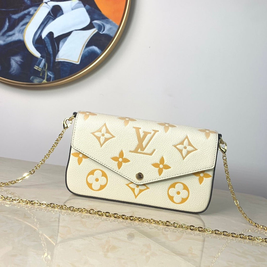 Louis Vuitton Monogram Empreinte Pochette 21cm White