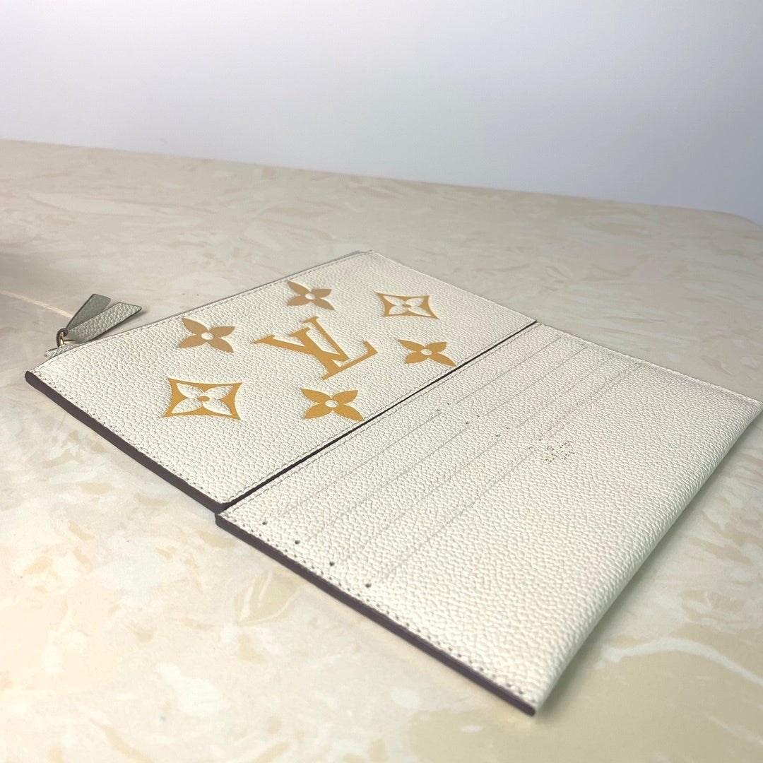Louis Vuitton Monogram Empreinte Pochette 21cm White