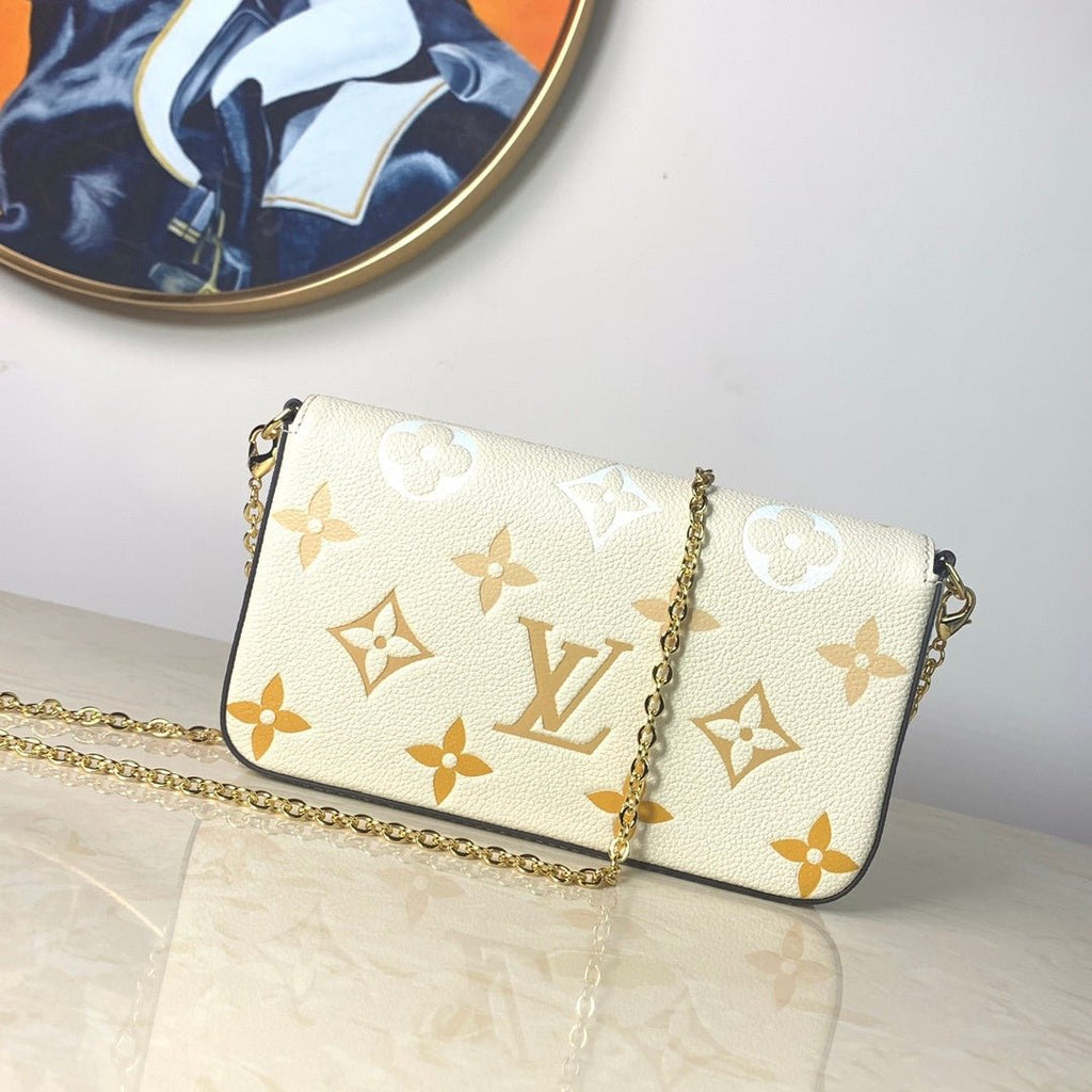 Louis Vuitton Monogram Empreinte Pochette 21cm White
