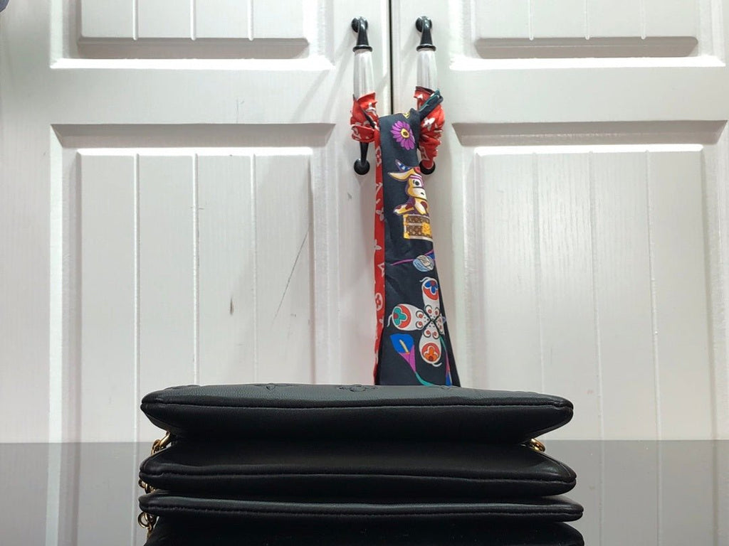 Louis Vuitton POCHETTE COUSSIN 20cm Black