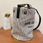 Saint Laurent Rive Gauche Bucket Bag In Striped Canvas For Women 30cm Black And White YSL 669299FAAE59583