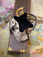Louis Vuitton The NéoNoé MM M46023 bucket bag in Monogram Empreinte Crème Beige / Black