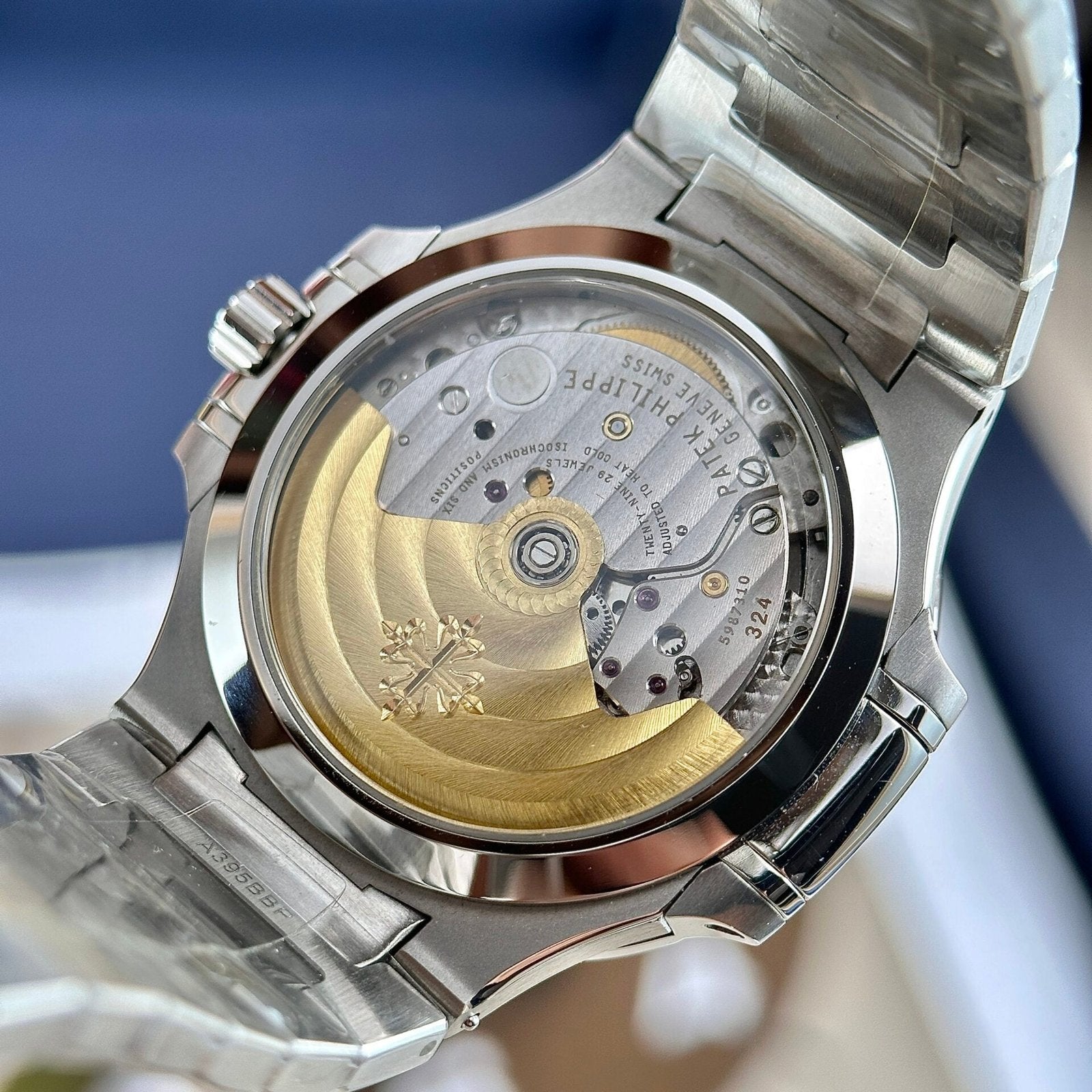Patek Philippe Nautilus 7118 Watch Blue Dial Stone Bezel 35.2mm