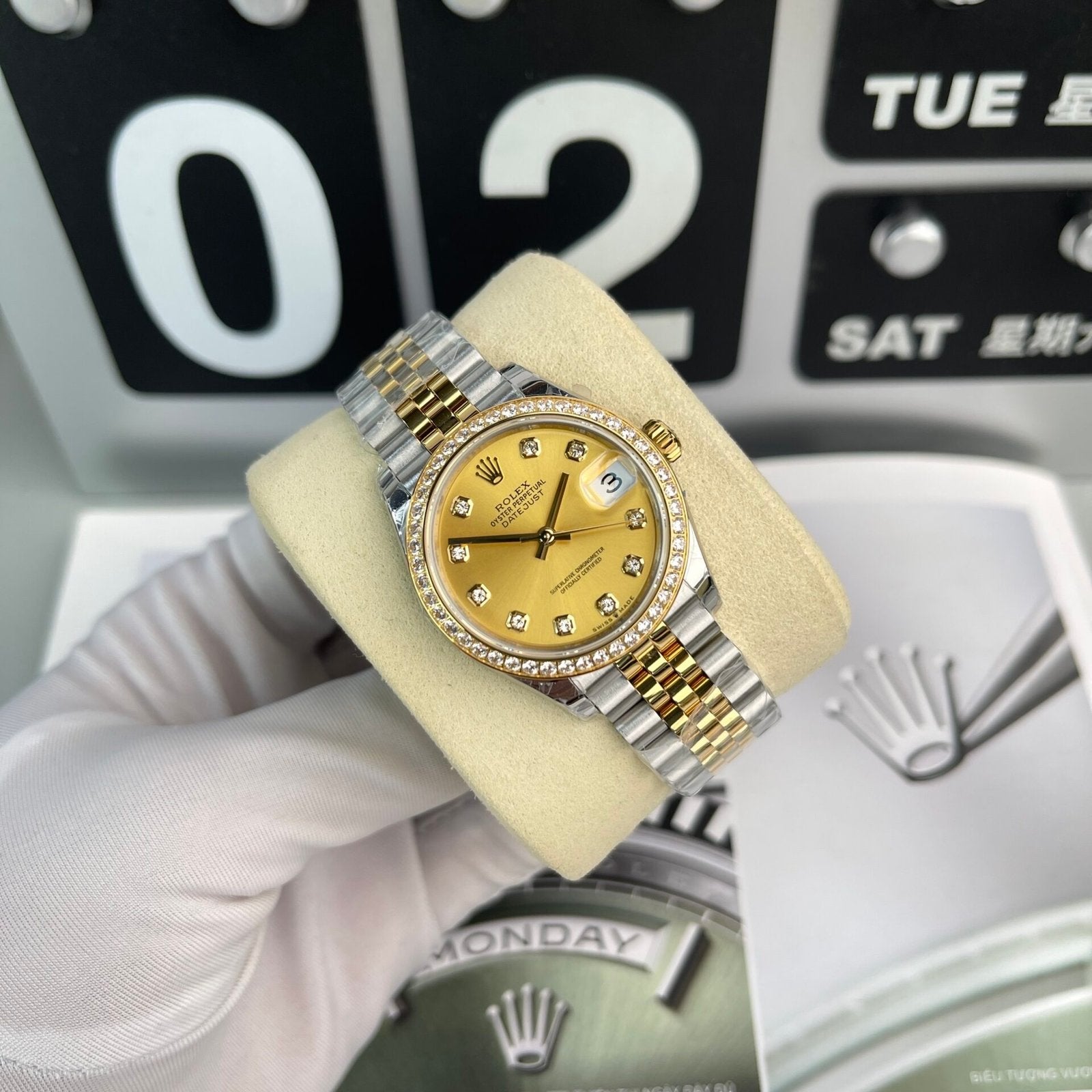 Rolex DateJust Women’s Watch With Stone Bezel Champagne Dial 31mm