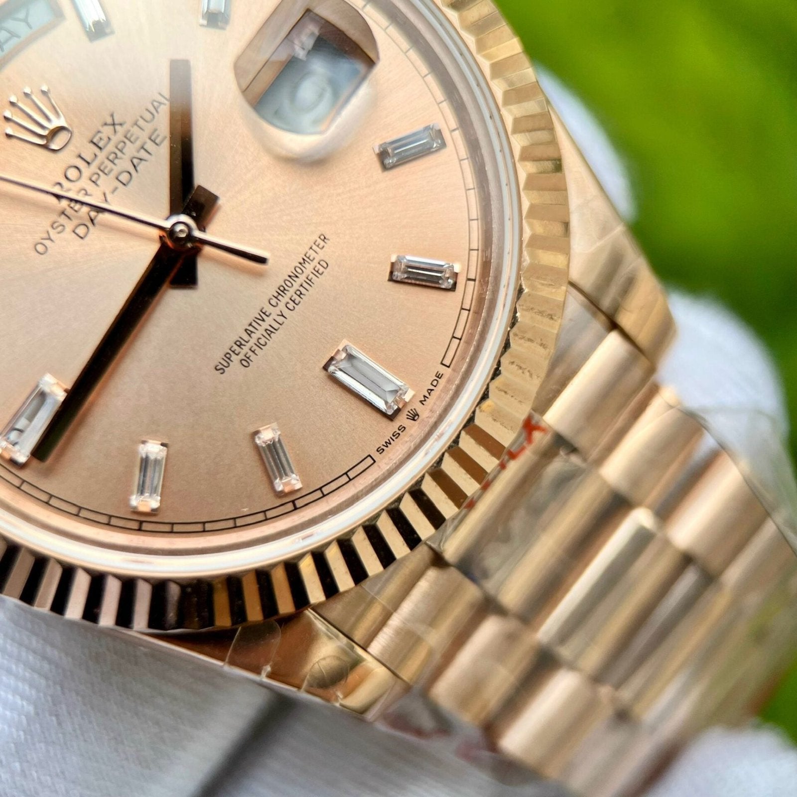 Rolex Day-Date 228235 Pink Dial Stone With Number 40mm