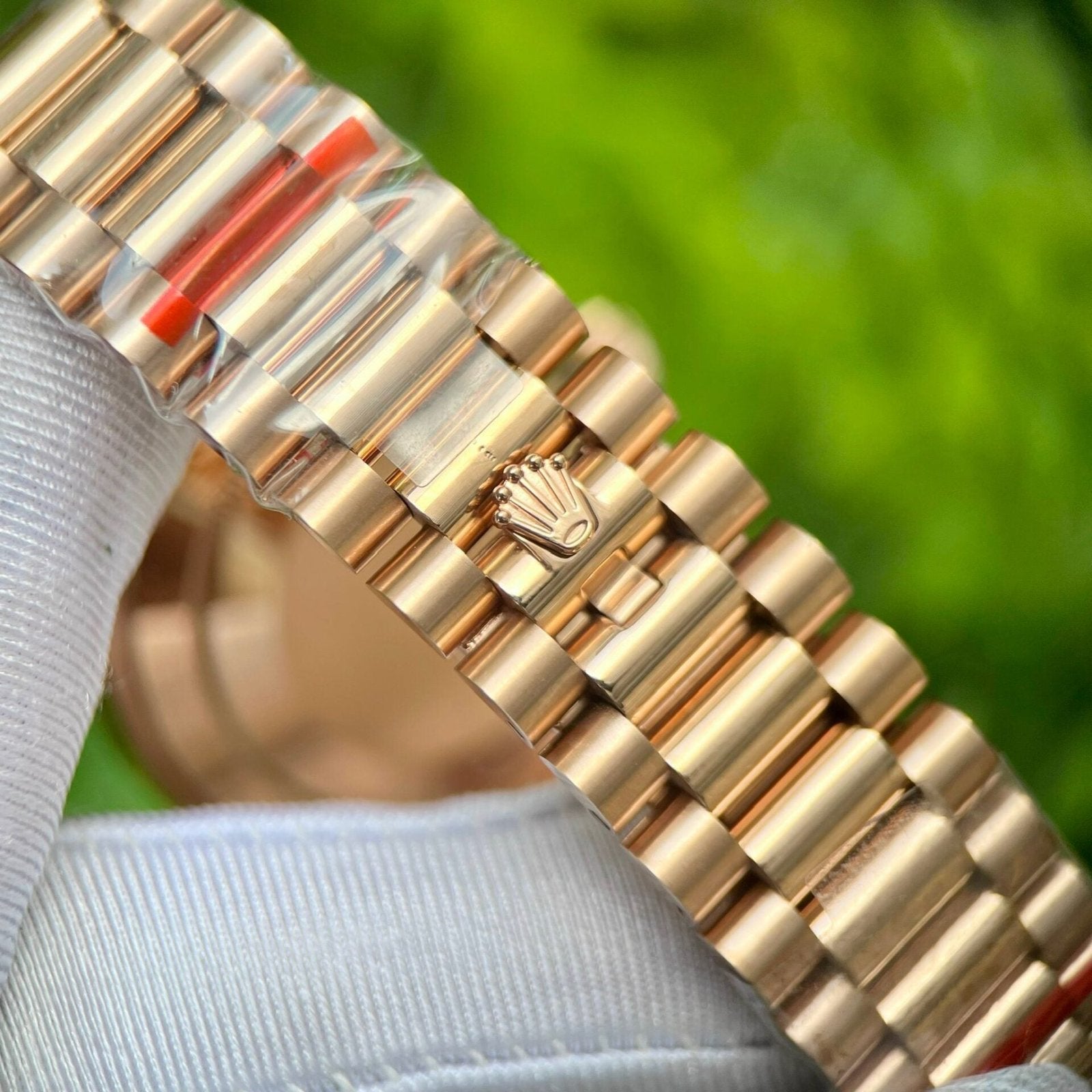 Rolex Day-Date 228235 Pink Dial Stone With Number 40mm