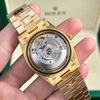 Rolex Day-Date 228238 Watch Yellow Dial President Strap 40mm