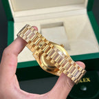 Rolex Day-Date 228238 Watch Yellow Dial President Strap 40mm