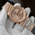 Rolex Day-Date Pink Sundust Dial Watch 40mm