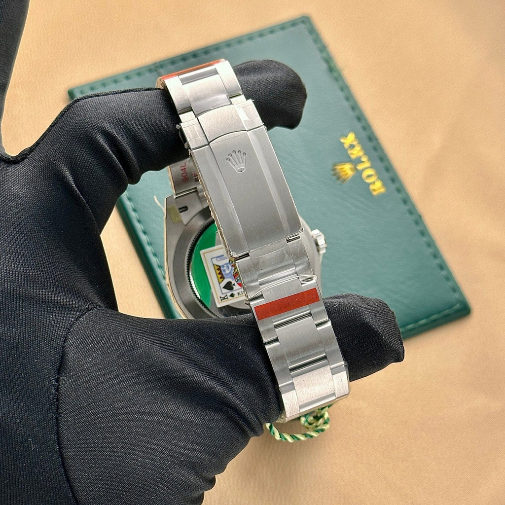 Rolex Oyster Perpetual 124300 Red Dial Oyster Strap 41mm