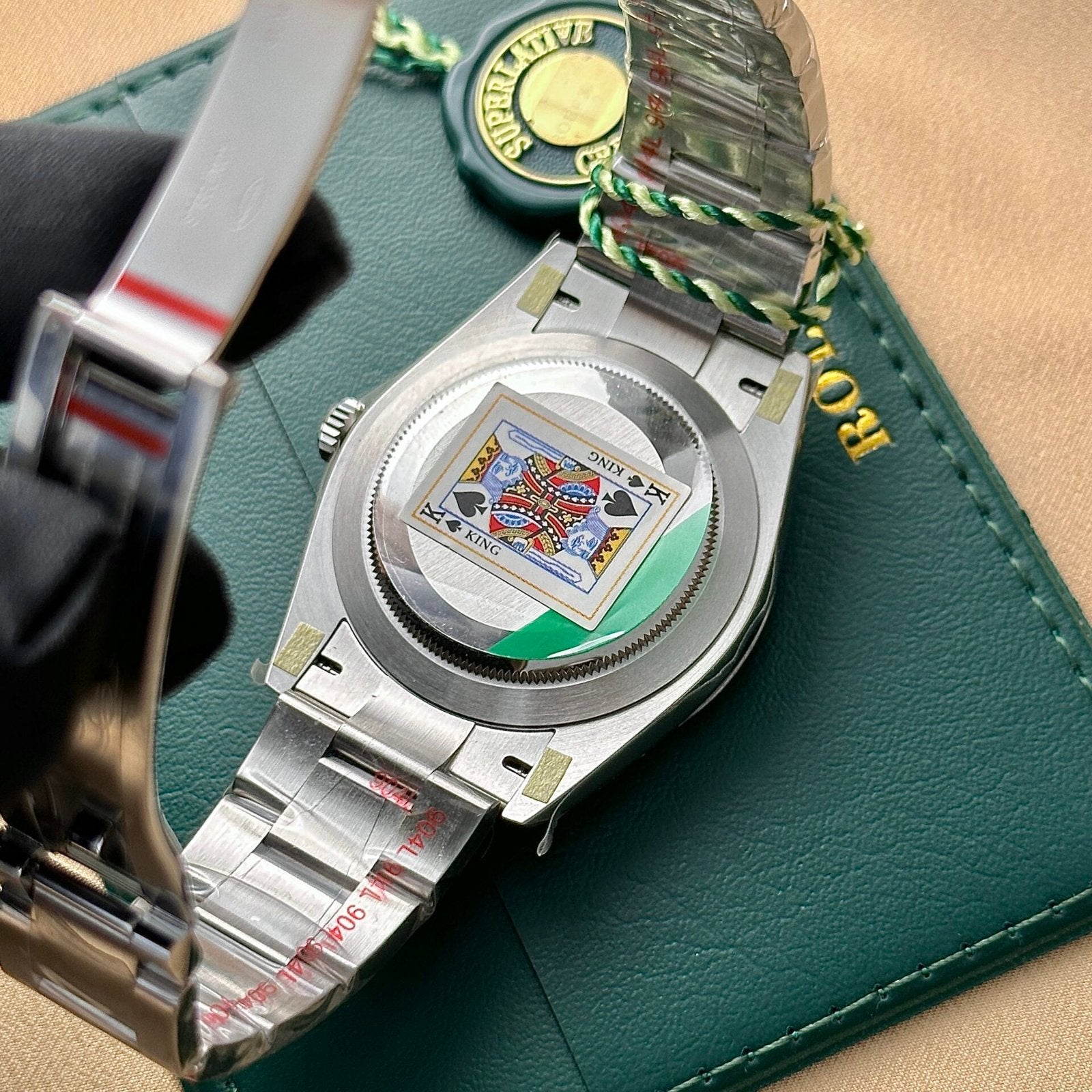 Rolex Oyster Perpetual 124300 Red Dial Oyster Strap 41mm