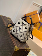 Louis Vuitton The NéoNoé MM M46023 bucket bag in Monogram Empreinte Crème Beige / Black