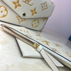 Louis Vuitton Monogram Empreinte Pochette 21cm White