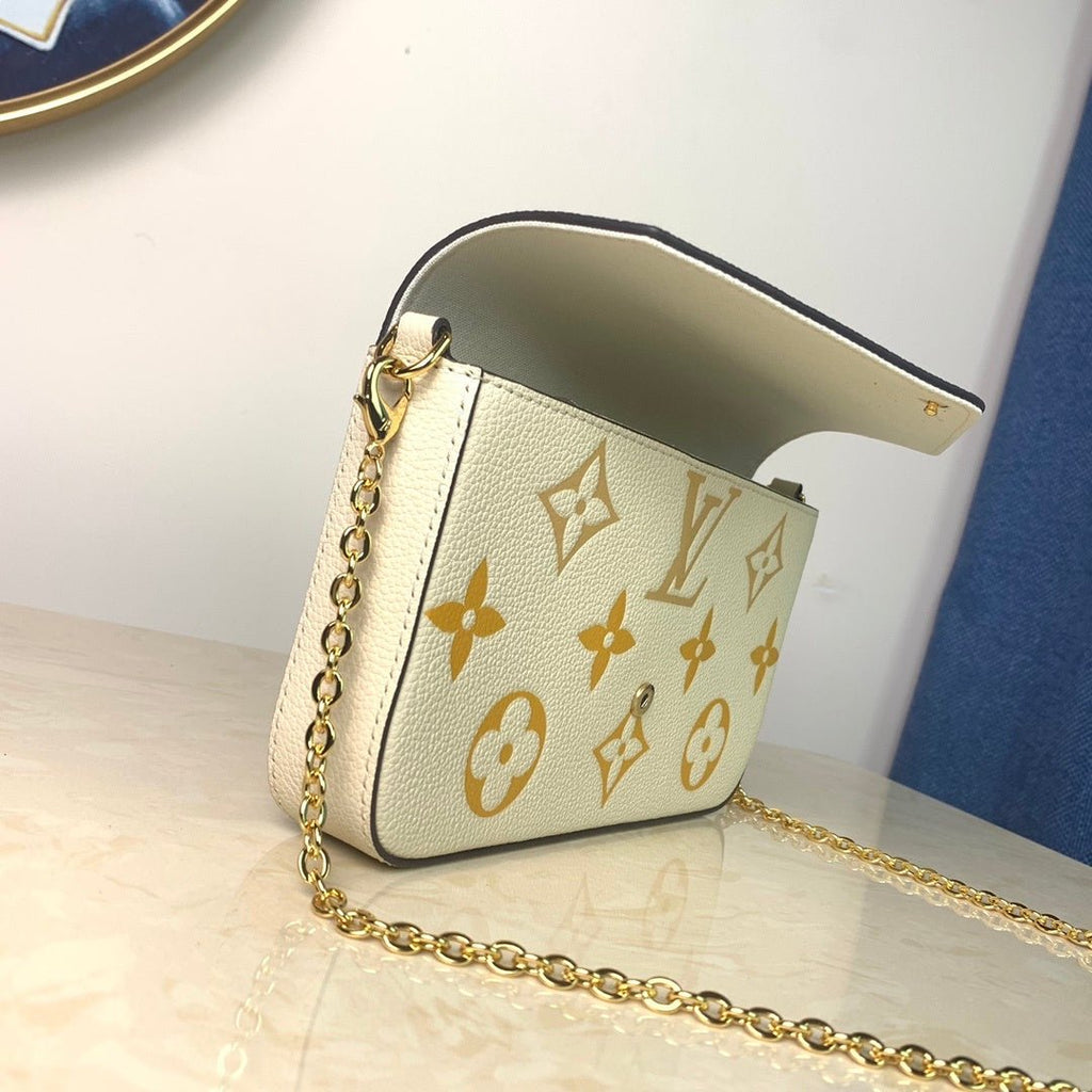 Louis Vuitton Monogram Empreinte Pochette 21cm White