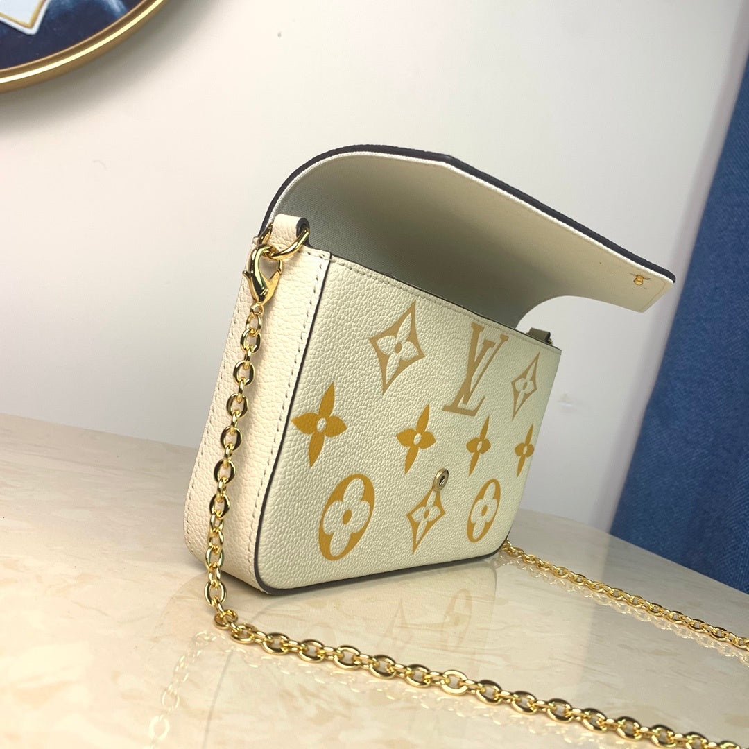 Louis Vuitton Monogram Empreinte Pochette 21cm White