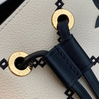 Louis Vuitton The NéoNoé MM M46023 bucket bag in Monogram Empreinte Crème Beige / Black