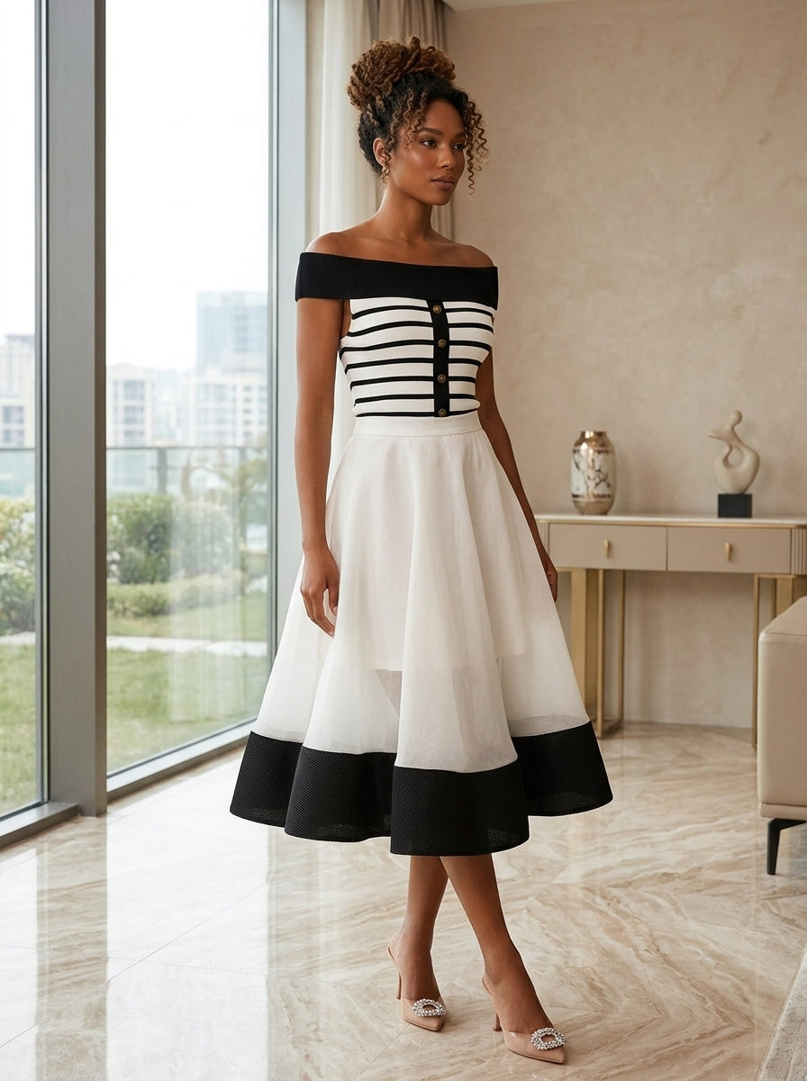 Black cropped knit top with decorative button detail