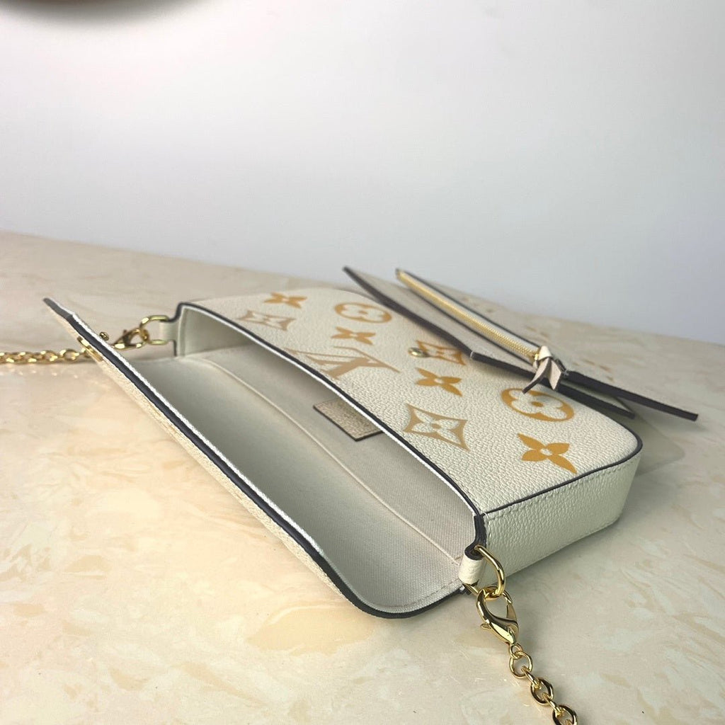 Louis Vuitton Monogram Empreinte Pochette 21cm White