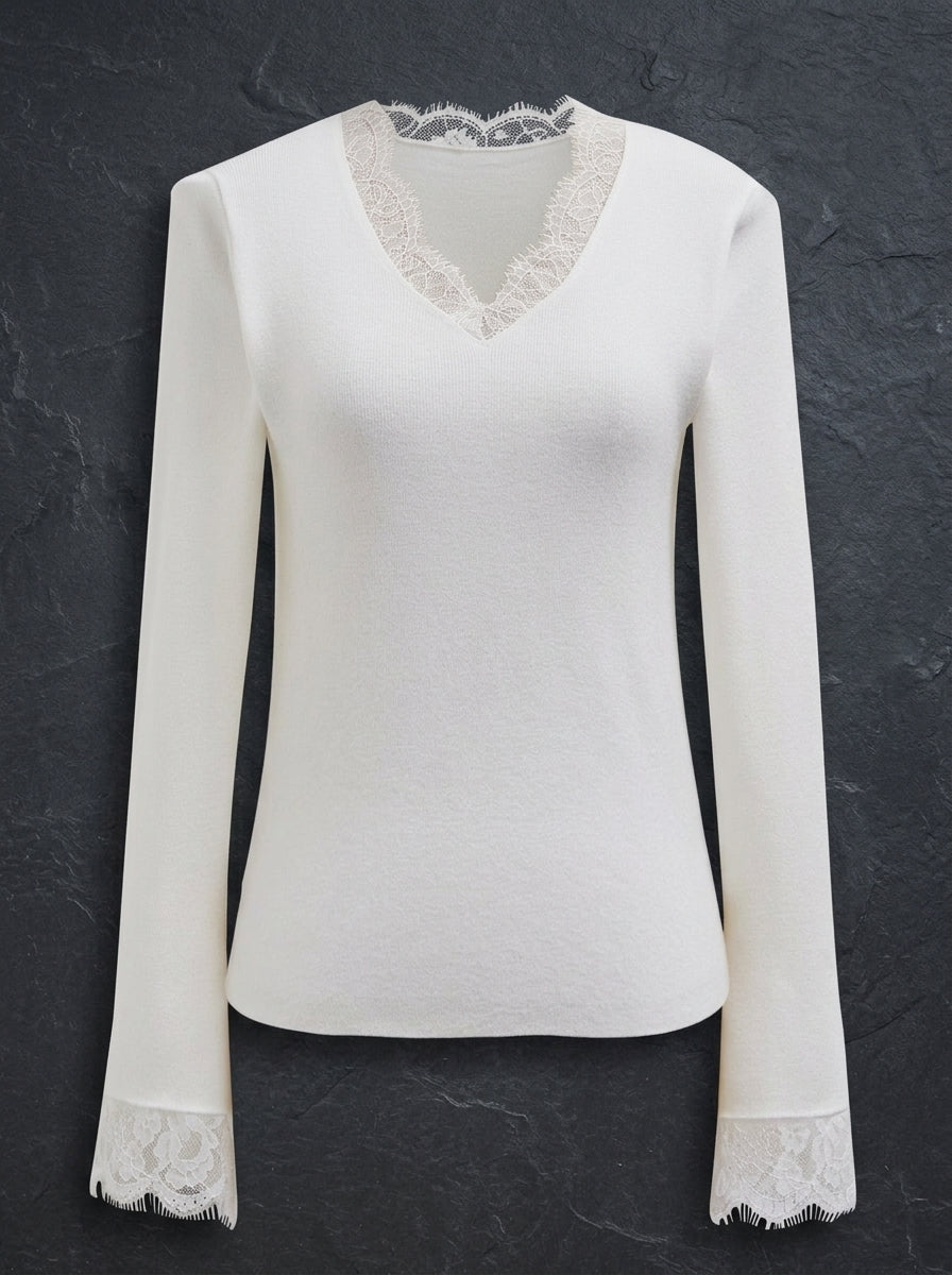 Elegant white bell sleeve blouse with delicate lace details